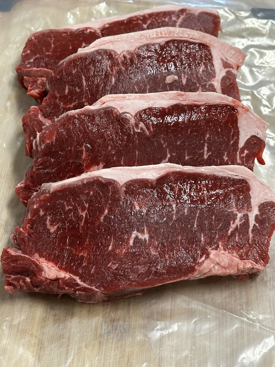 Fresh striploin steaks ready for a Saskatchewan table