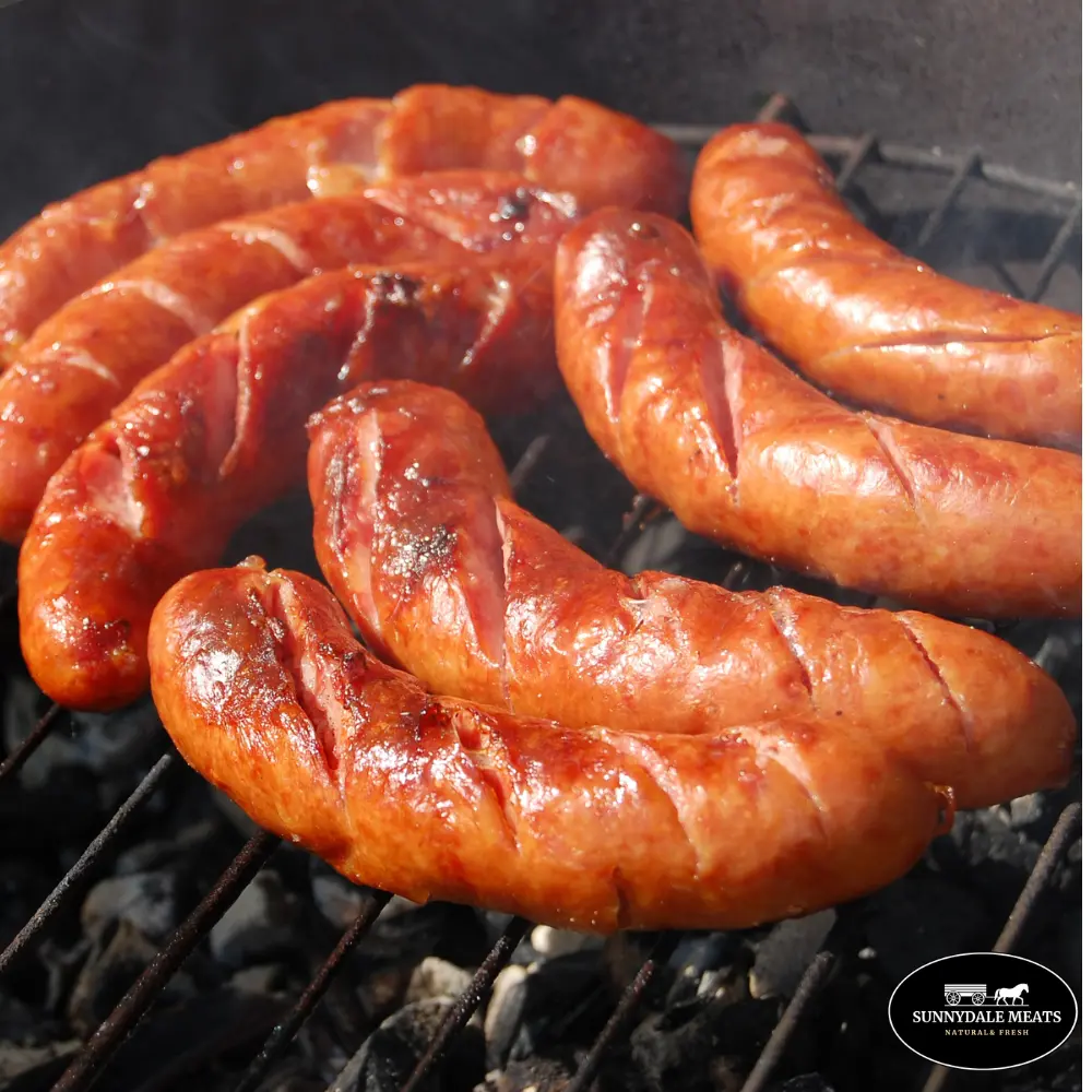 Sunnydale farmer sausage cooking on the grill